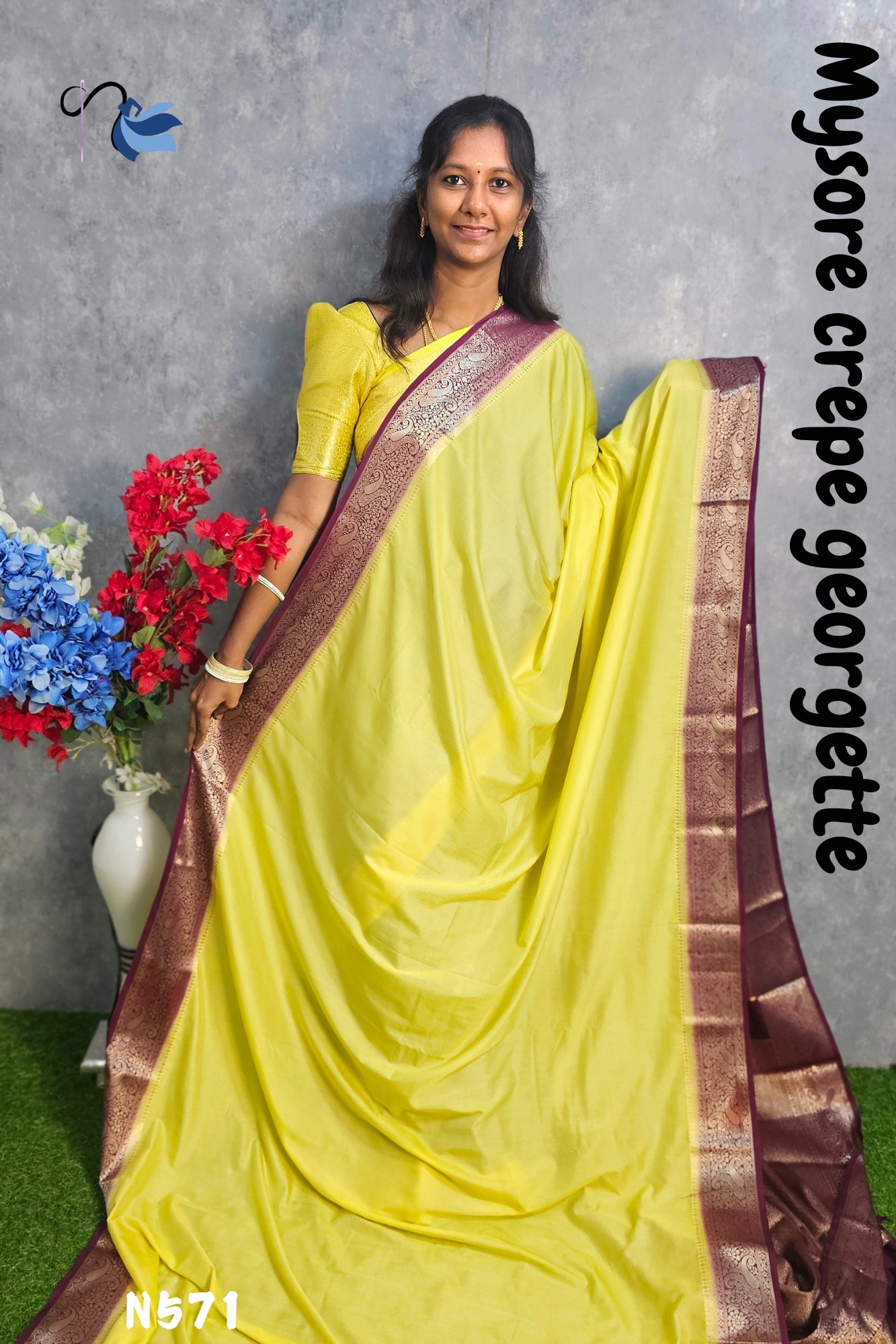 Draped in elegance with this stunning Mysore crepe georgette saree